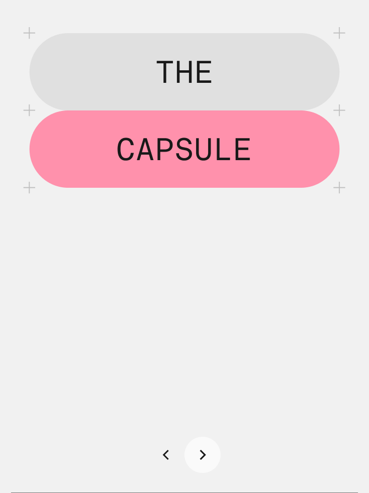 Two stacked capsules reading “The” and “Capsule”