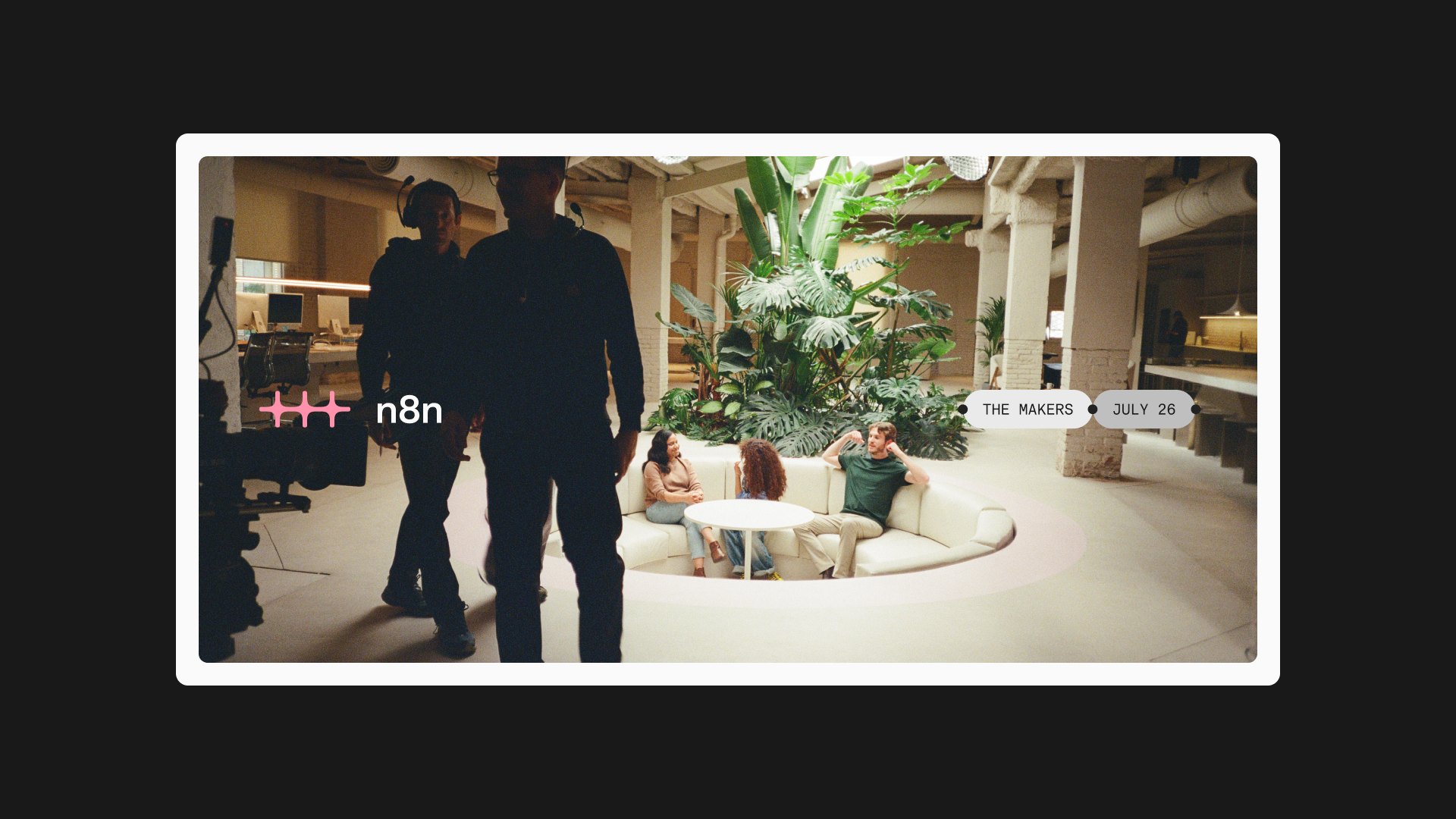 Office photo in a white frame with the n8n logo and connected capsules