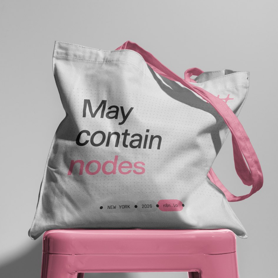 Tote bag printed “May contain nodes” on a pink stool
