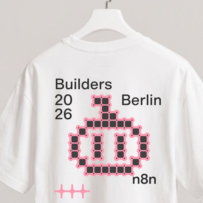 A white “Builders Berlin 2026” t-shirt with a pixel illustration crossing the type
