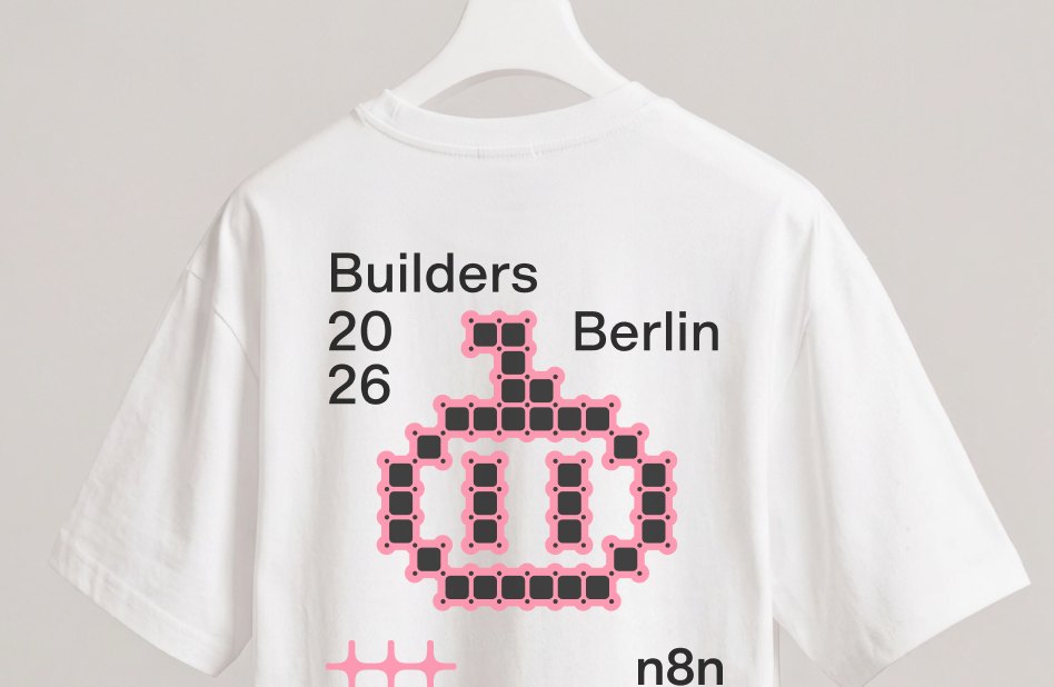 A white “Builders Berlin 2026” t-shirt with a pixel illustration crossing the type